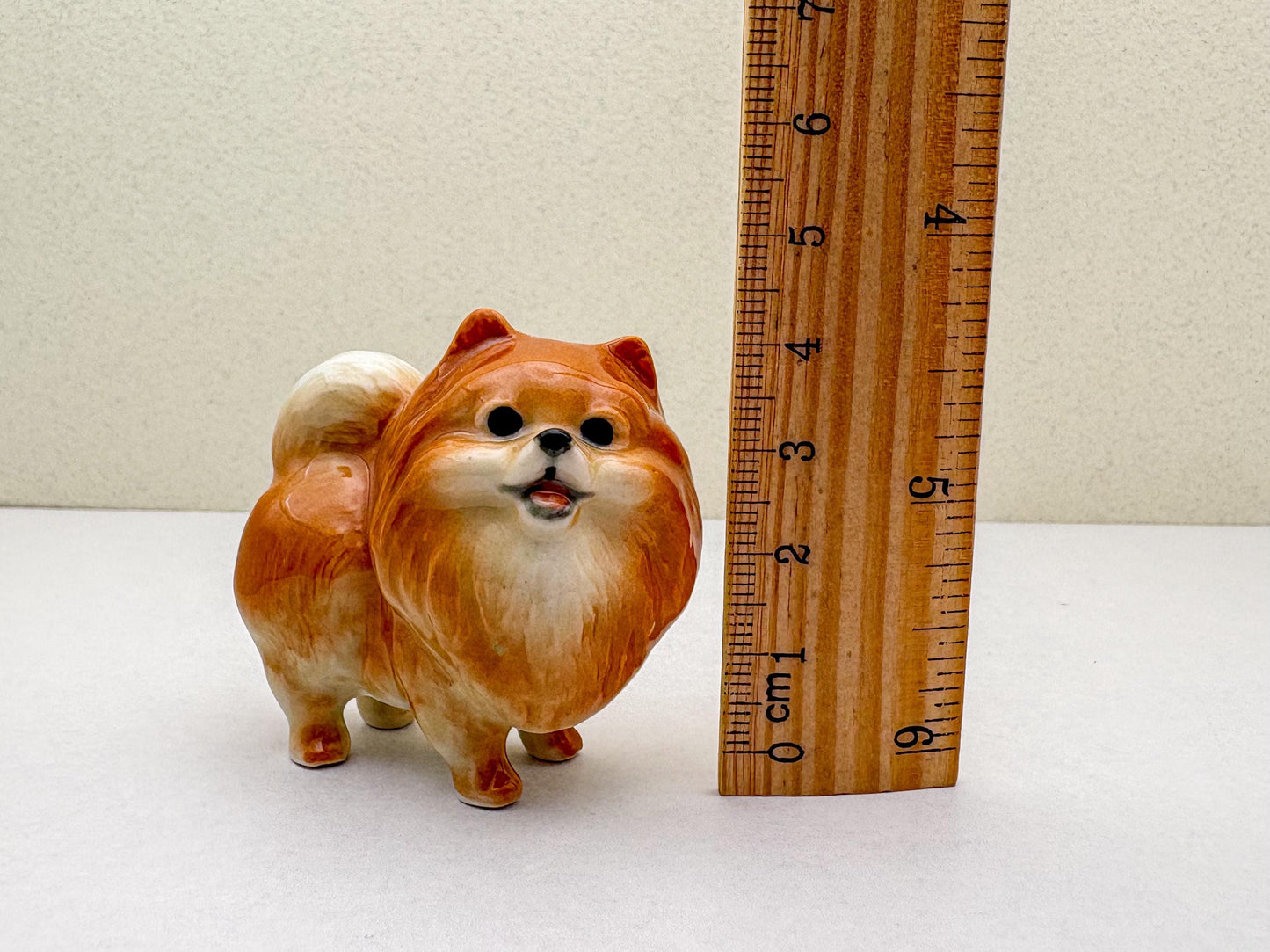 Orange Pomeranian Ceramic Dog Figurines Trio – Hand-Painted Miniatures for Animal Lovers, Cute Gifts, or Home & Office Decoration