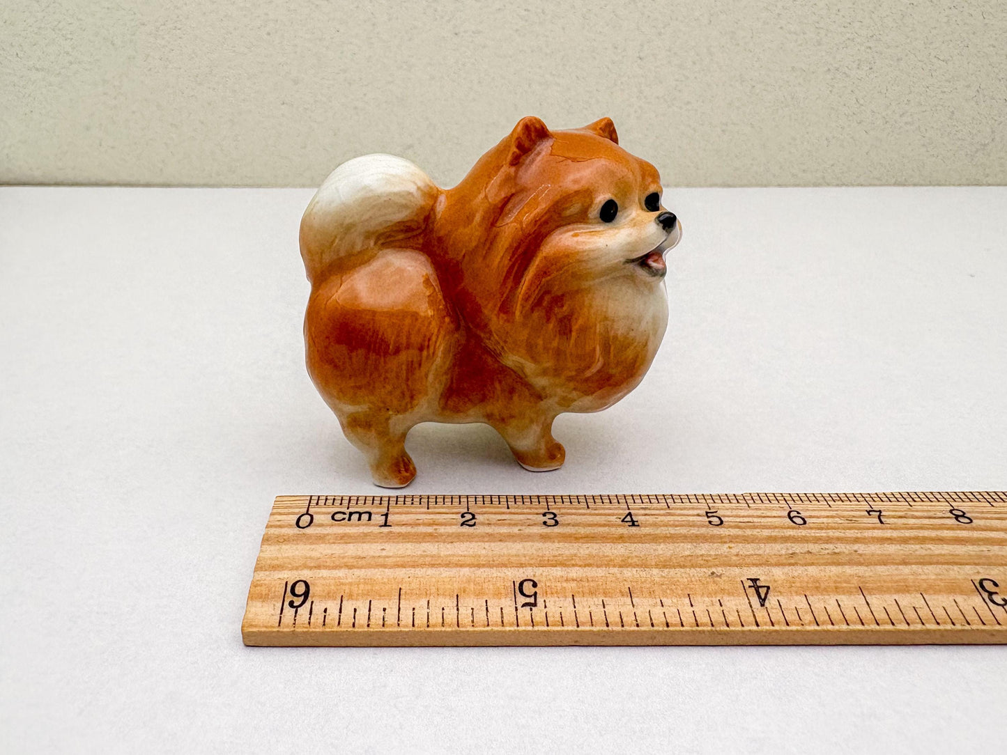 Orange Pomeranian Ceramic Dog Figurines Trio – Hand-Painted Miniatures for Animal Lovers, Cute Gifts, or Home & Office Decoration