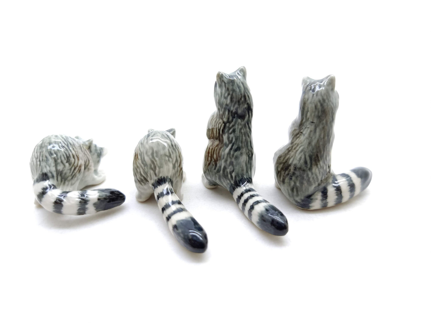 Set of 4 Raccoon Ceramic Figurine Animal Miniature Statue