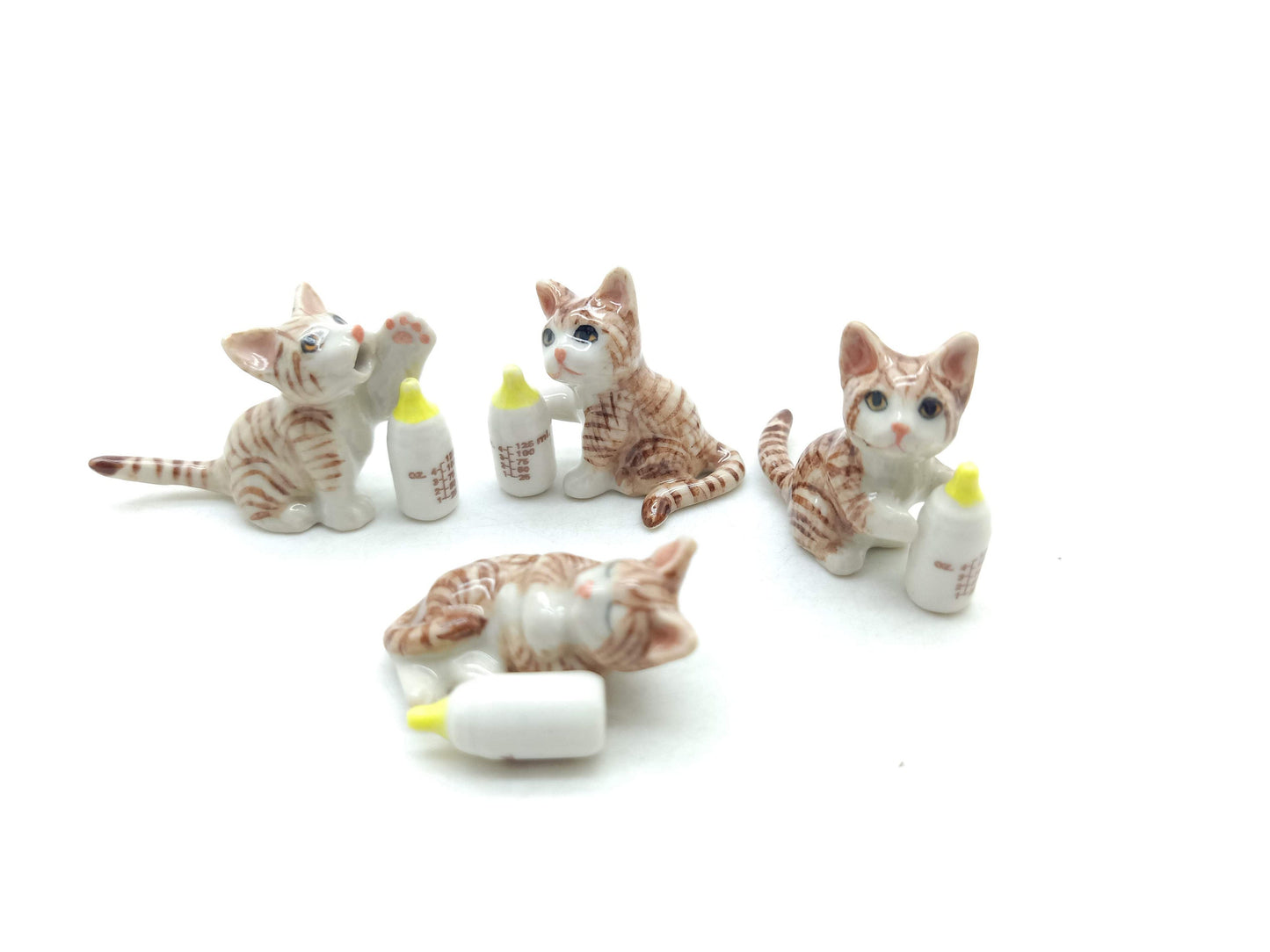 4 Kitten Cats with Milk Bottles
