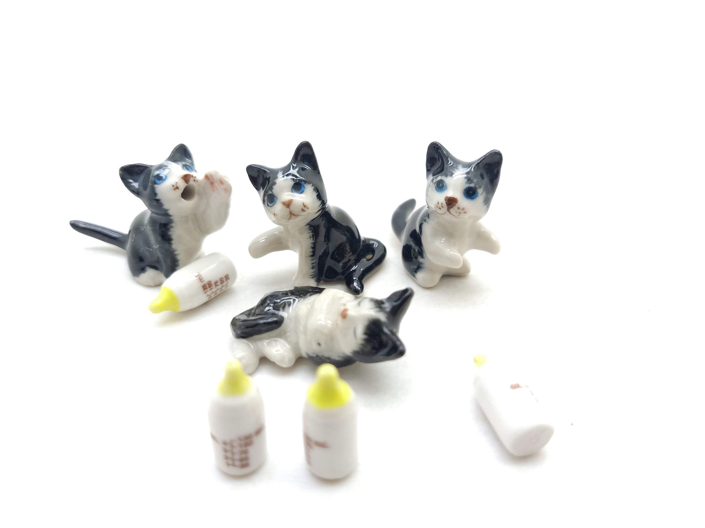 4 Kitten Cats with Milk Bottles