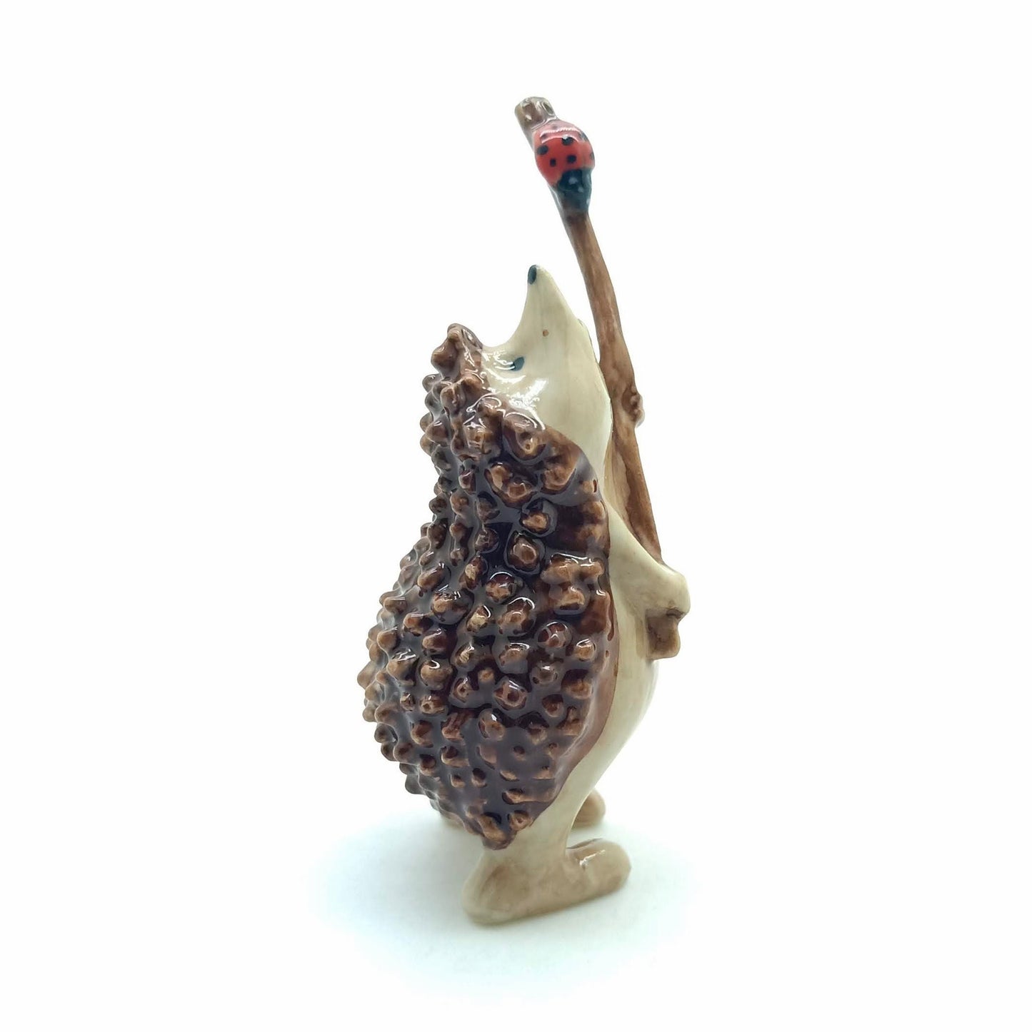 Hedgehog Porcupine Ceramic Figurine Holding Stick with Ladybug