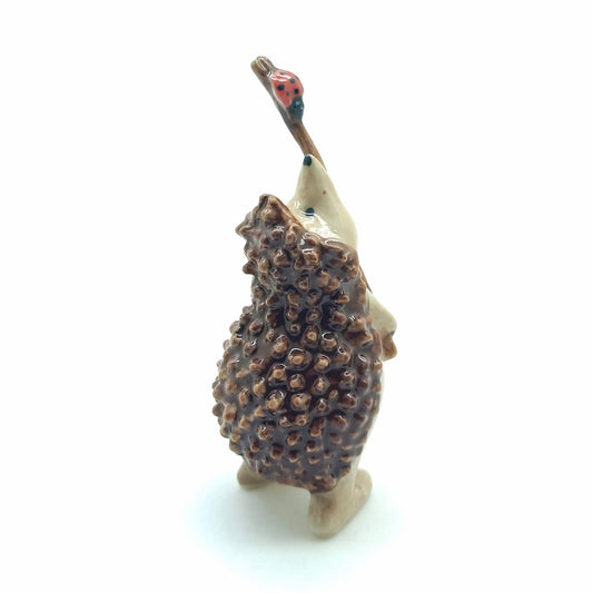 Hedgehog Porcupine Ceramic Figurine Holding Stick with Ladybug