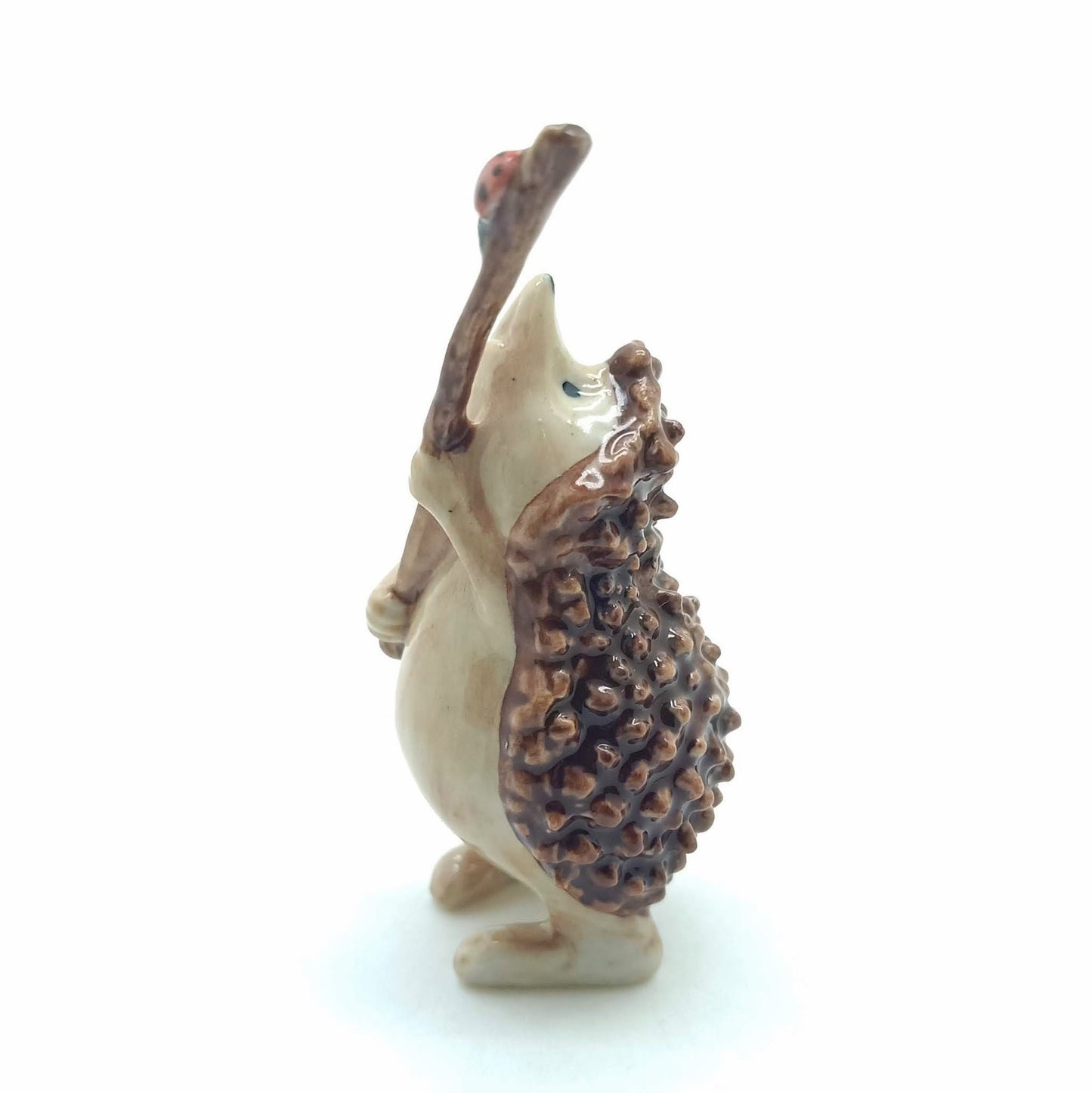 Hedgehog Porcupine Ceramic Figurine Holding Stick with Ladybug