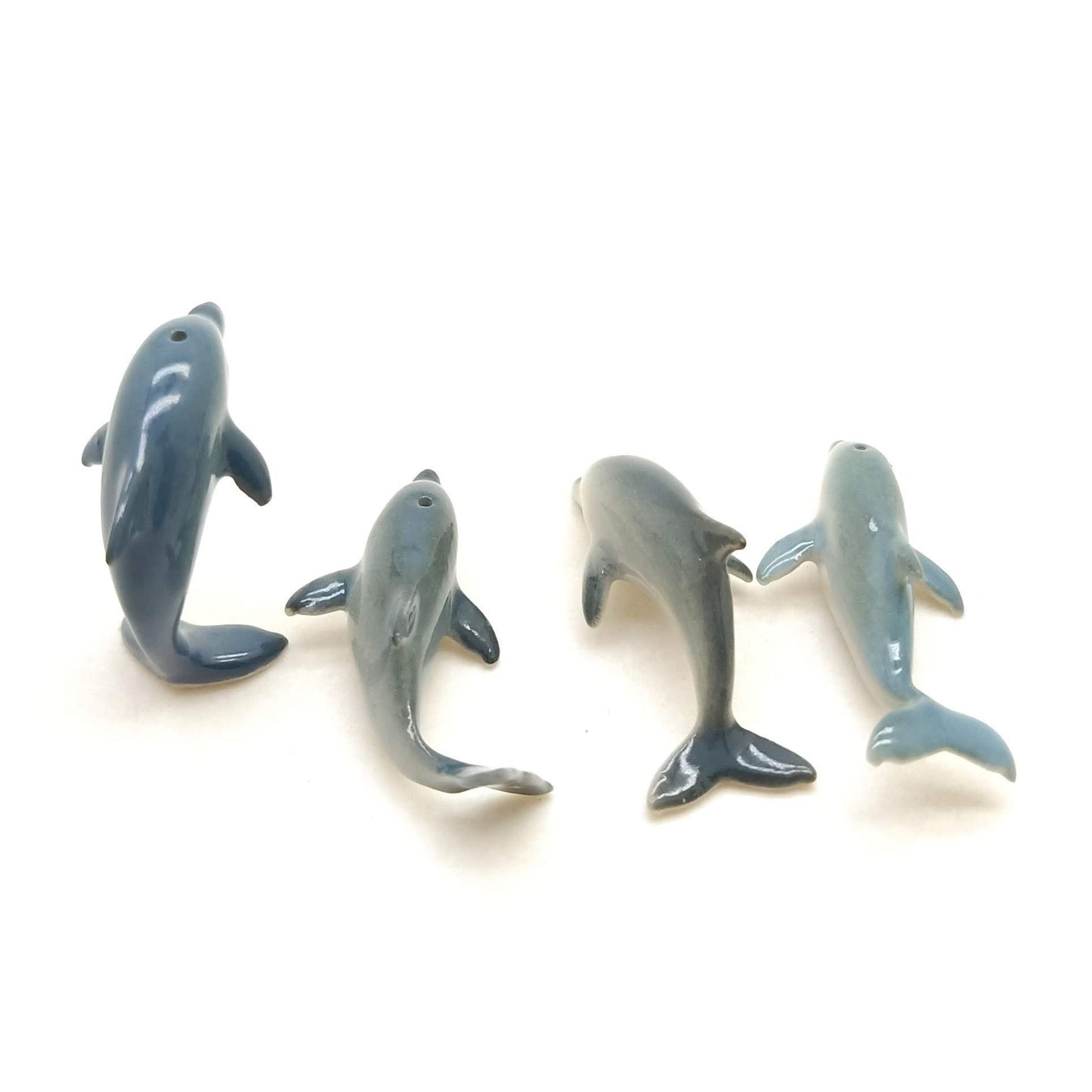 4 Tiny Thin Dolphins
