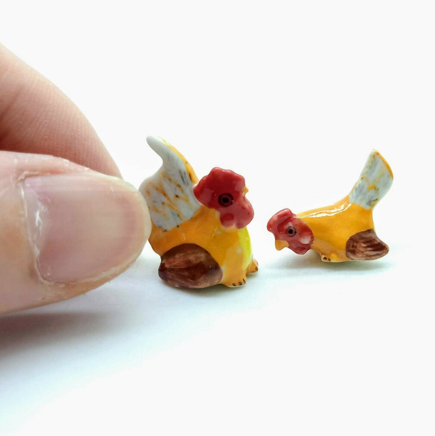 2 Tiny Hen Cocks