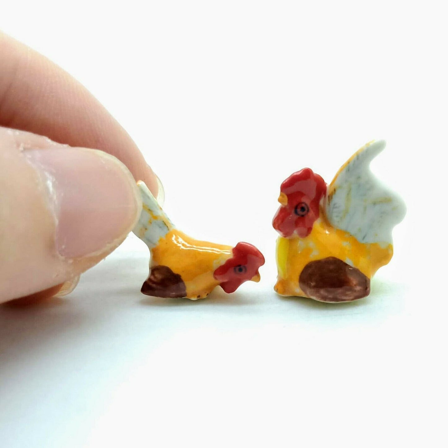 2 Tiny Hen Cocks