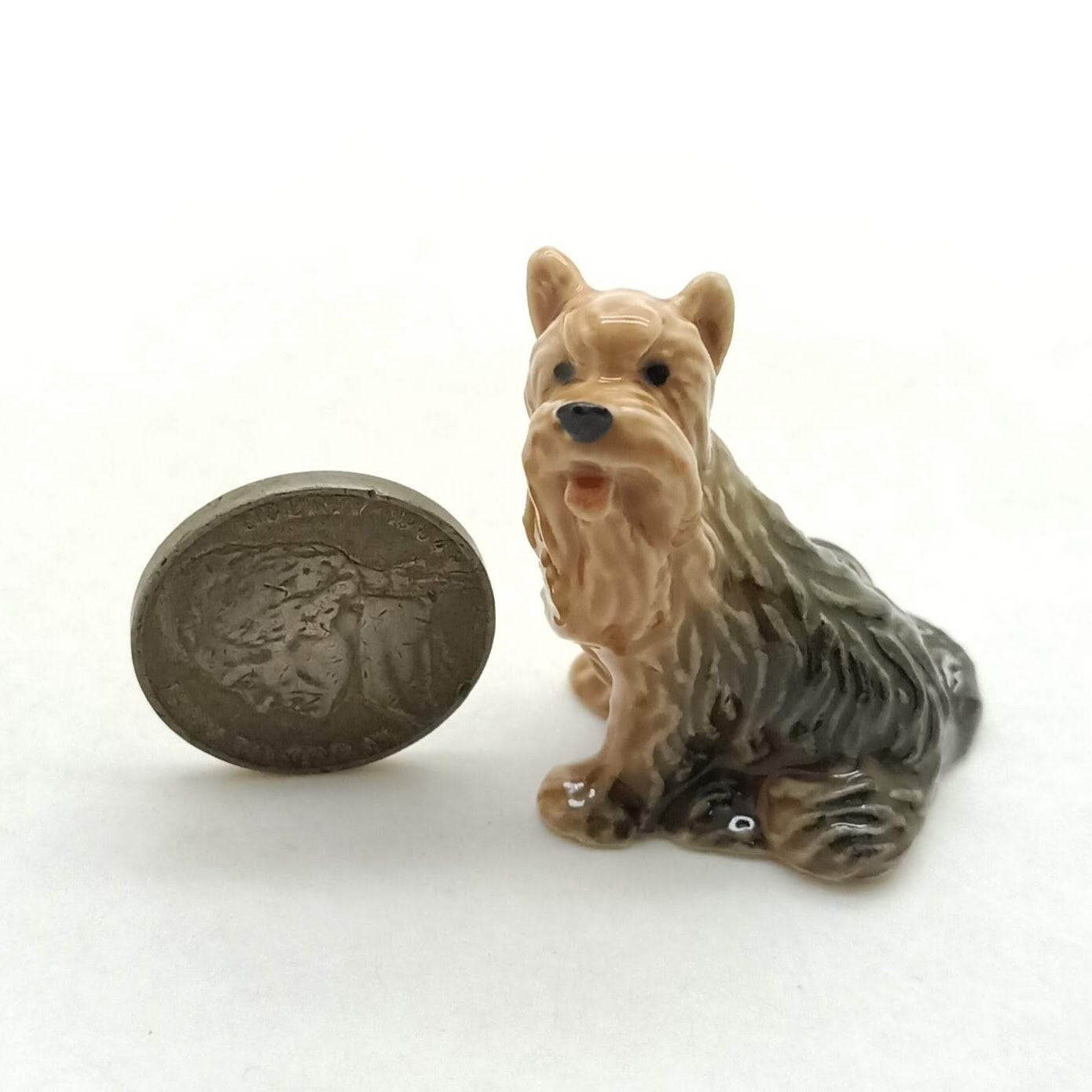 4 Yorkshire Terrier Figurines