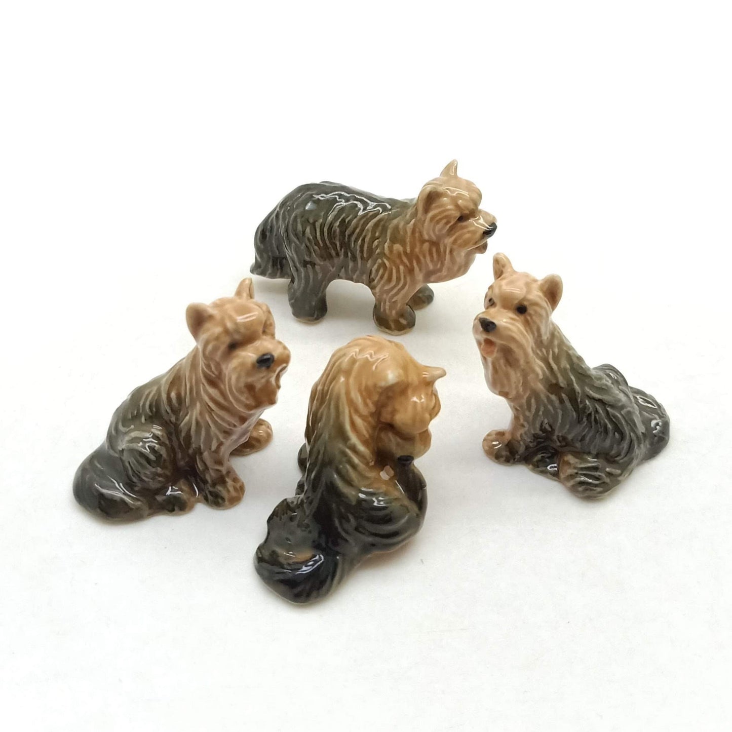 4 Yorkshire Terrier Figurines