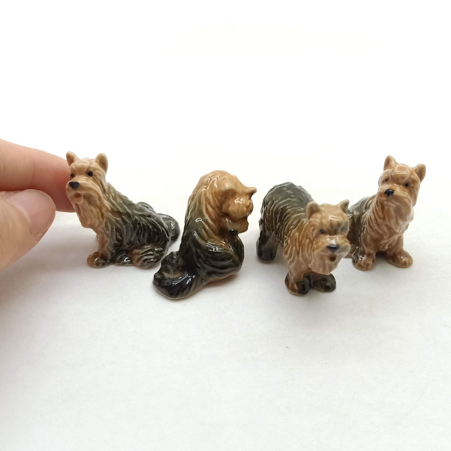 4 Yorkshire Terrier Figurines