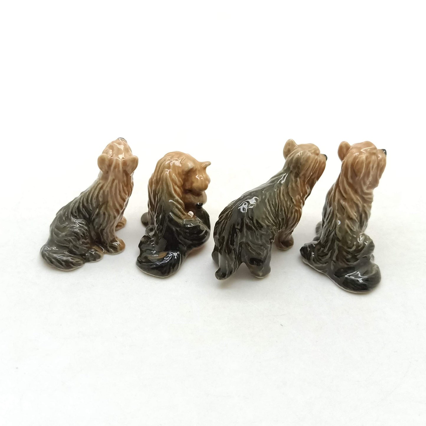 4 Yorkshire Terrier Figurines