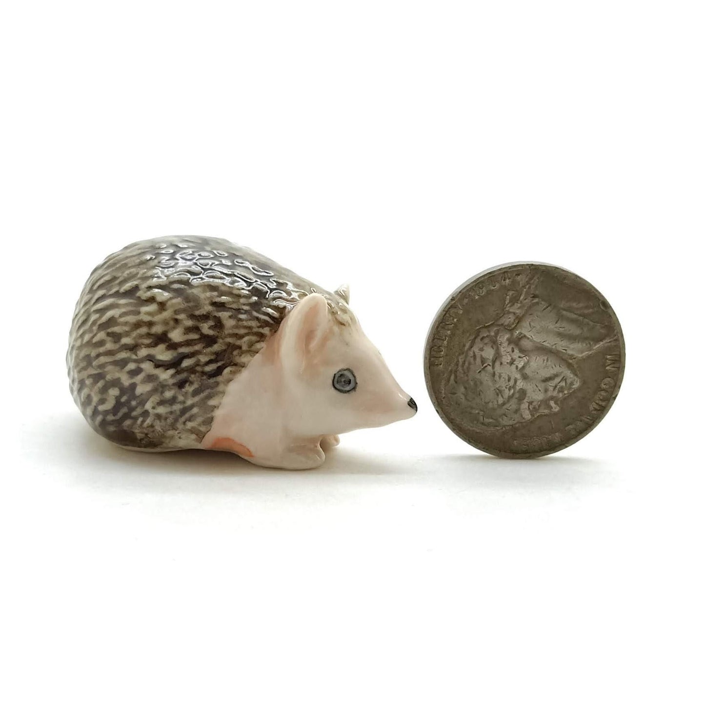 2 Hedgehog Porcupines with Tree Trunk