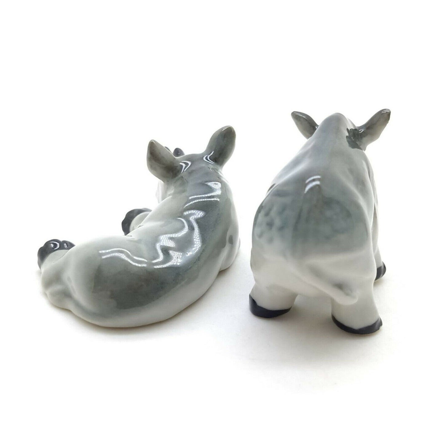 2 Rhino Figurines: Where Art Meets Adventure