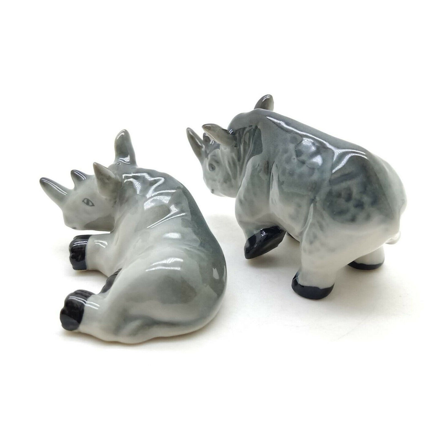 2 Rhino Figurines: Where Art Meets Adventure