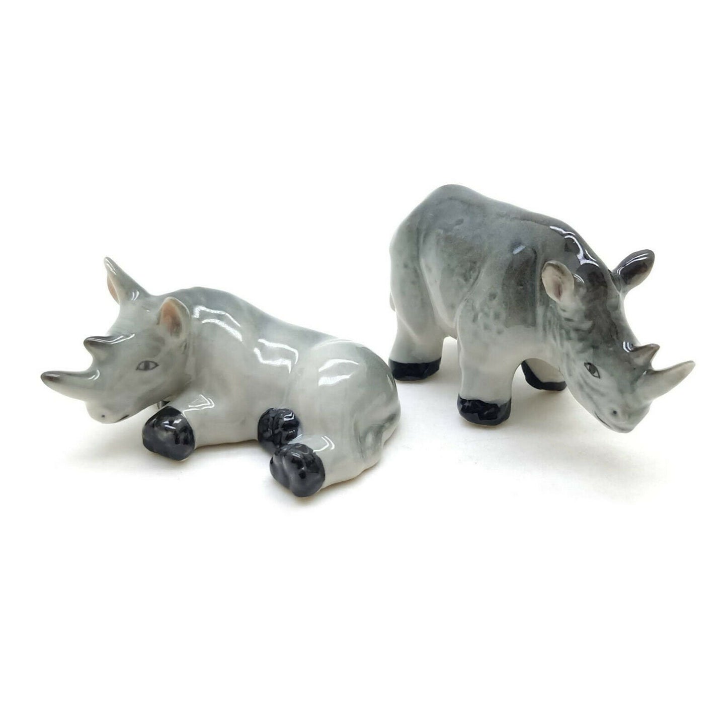 2 Rhino Figurines: Where Art Meets Adventure