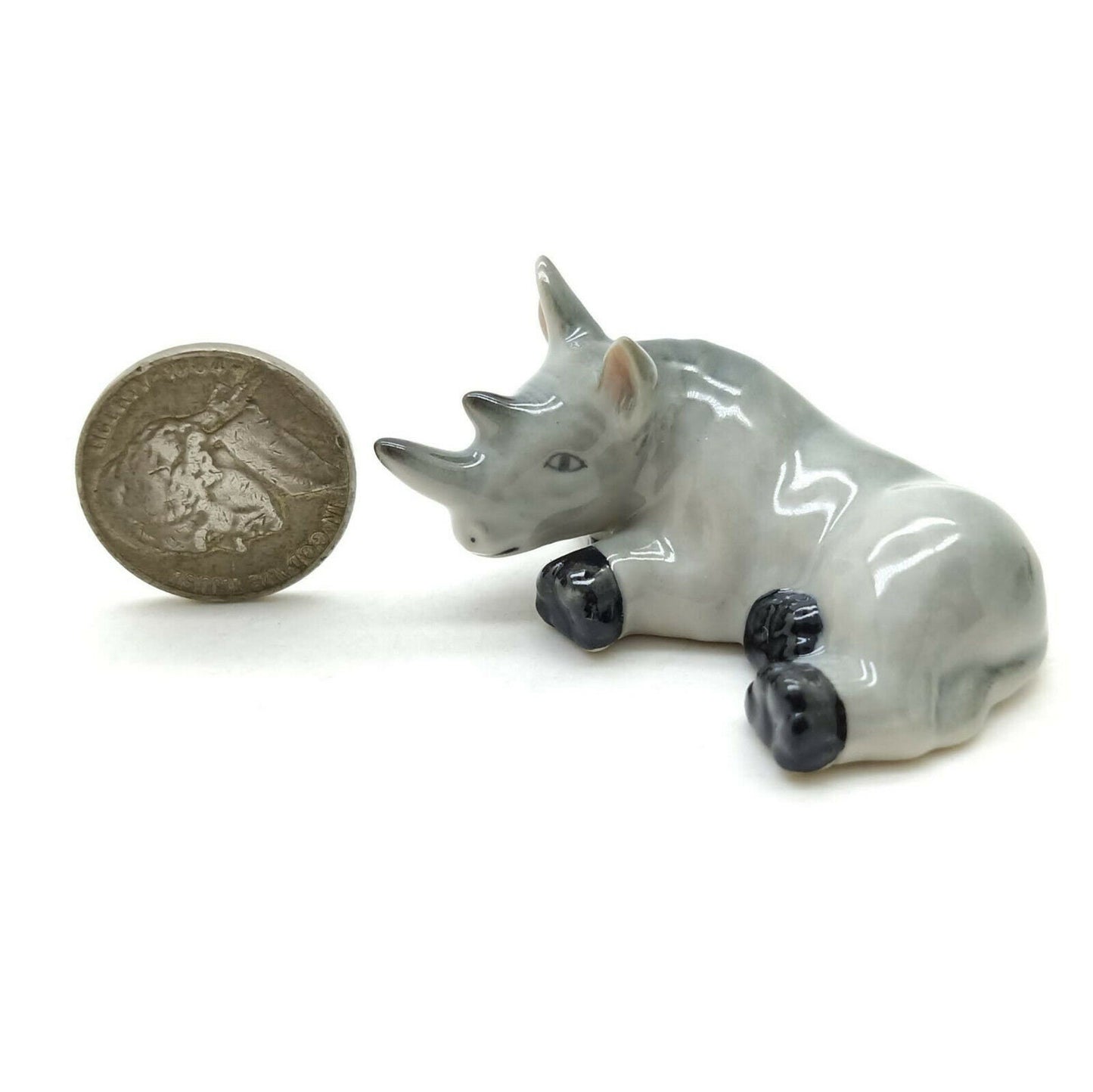 2 Rhino Figurines: Where Art Meets Adventure