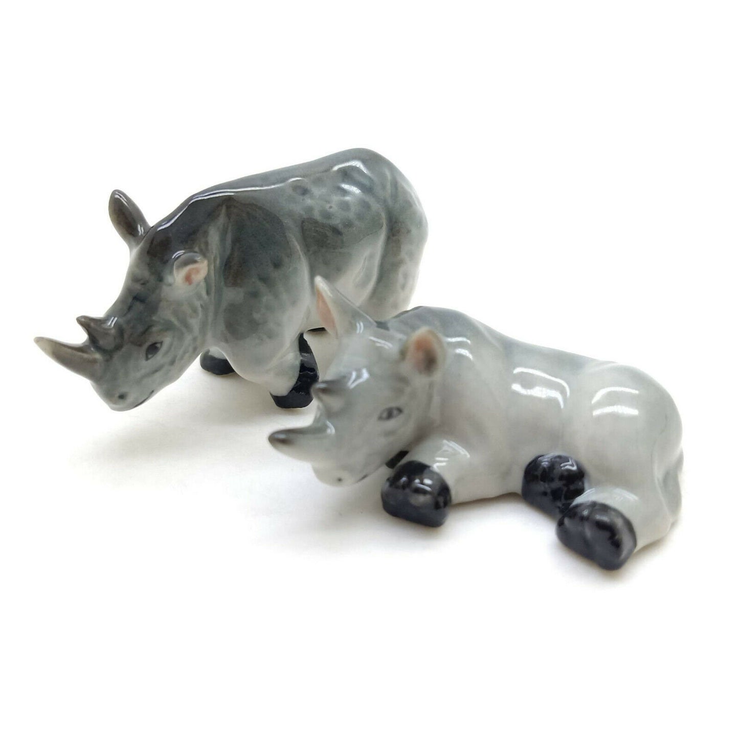 2 Rhino Figurines: Where Art Meets Adventure