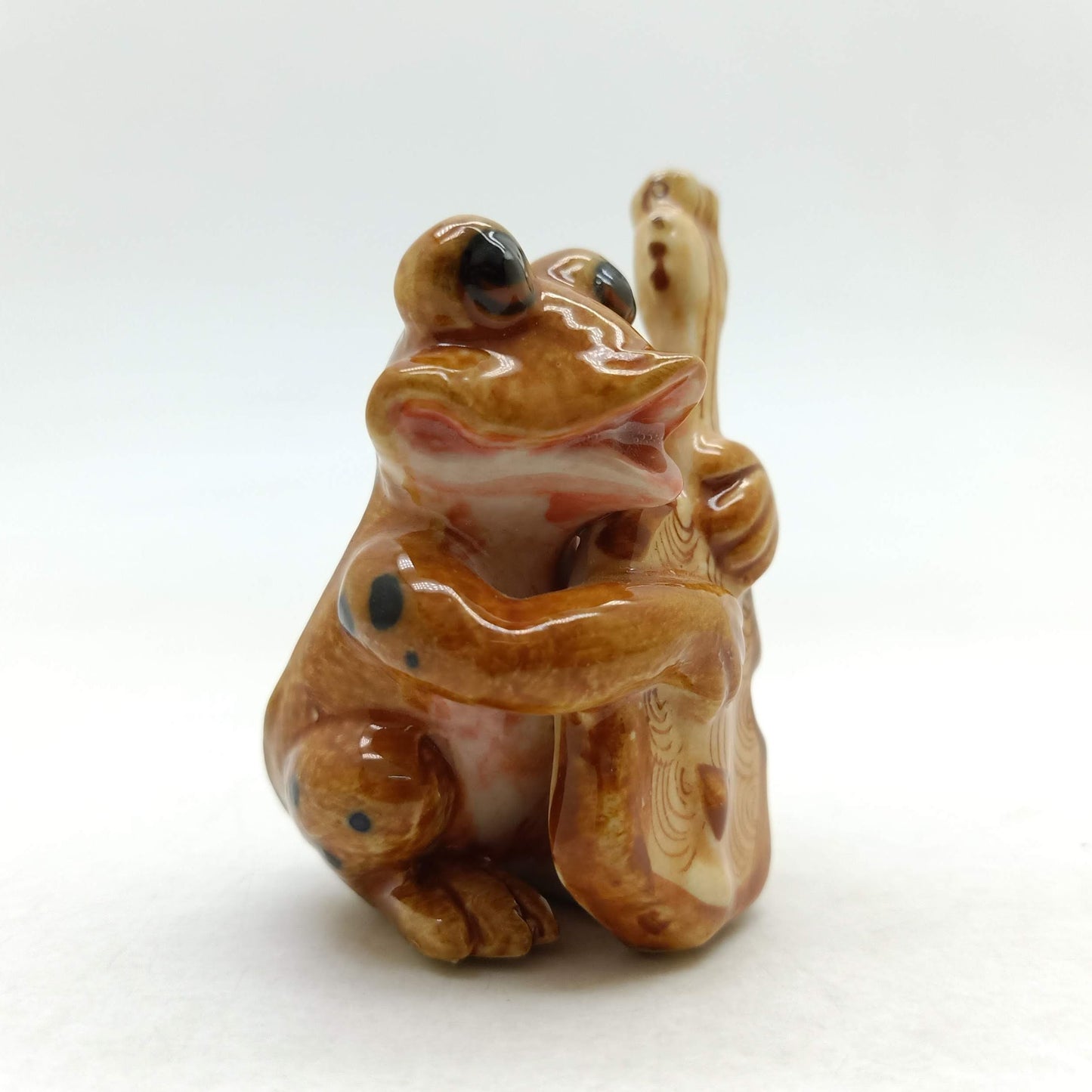 Brown Frog Bass Player Musician Ceramic Miniature Figurine