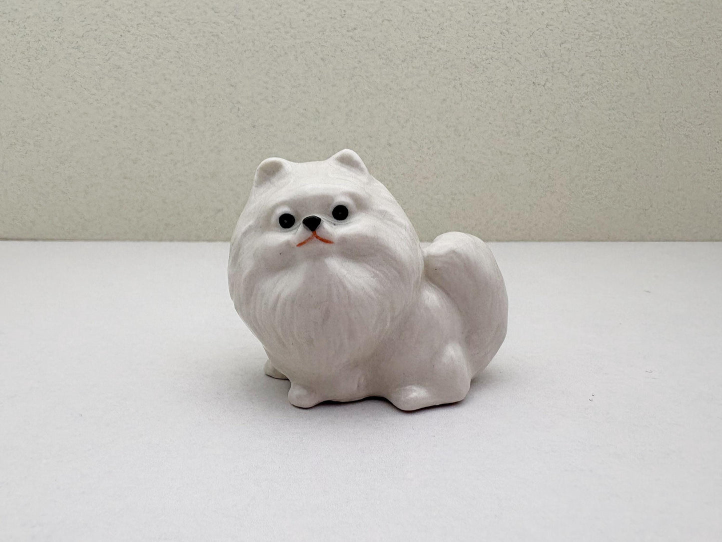 Charming White Ceramic Pomeranian Figurine Set, Trio of Lifelike Dog Figurines in Unique Poses, Ideal for Pet Lovers, Home Decor Enthusiasts