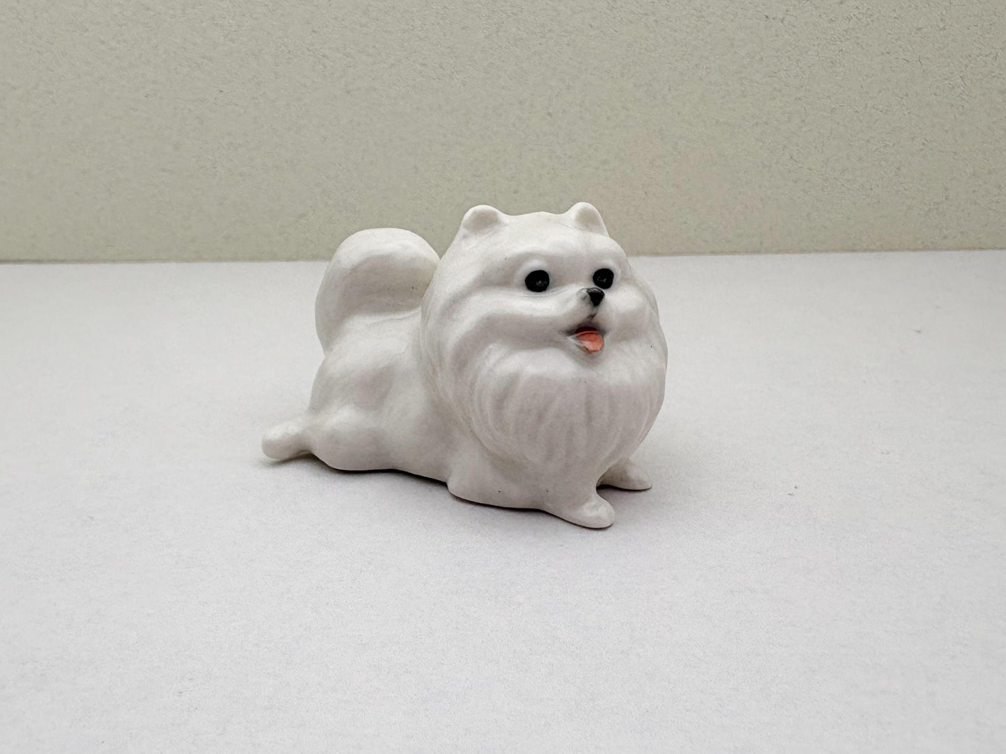 Charming White Ceramic Pomeranian Figurine Set, Trio of Lifelike Dog Figurines in Unique Poses, Ideal for Pet Lovers, Home Decor Enthusiasts