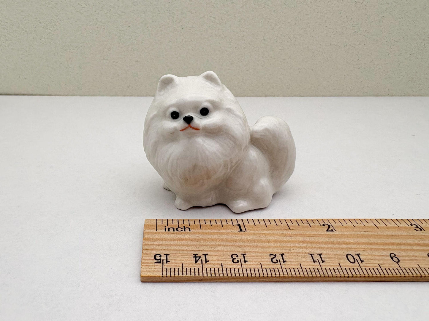 Charming White Ceramic Pomeranian Figurine Set, Trio of Lifelike Dog Figurines in Unique Poses, Ideal for Pet Lovers, Home Decor Enthusiasts