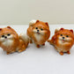 Orange Pomeranian Ceramic Dog Figurines Trio – Hand-Painted Miniatures for Animal Lovers, Cute Gifts, or Home & Office Decoration