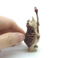 Hedgehog Porcupine Ceramic Figurine Holding Stick with Ladybug