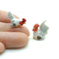2 Tiny Hen Cocks