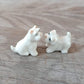 2 Tiny White West Terrier Dogs