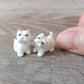 2 Tiny White West Terrier Dogs